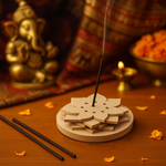 MDF floral incense stand with smoke rising, festive background