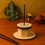 MDF round incense stick holder with multiple holes, surrounded by marigold flowers and diyas.