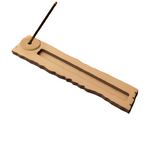 Minimalist MDF incense holder with zigzag edges, displaying stick incense