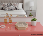 MDF DIY Jewellery Box on a pink surface including a hexagonal jewellery box, small plants, and bottles.