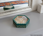 Hexagonal MDF DIY Jewellery Box with 'LOVE' necklace on a reflective surface