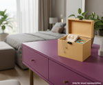 Yellow jewelry box on a purple dresser with a bedroom in the background