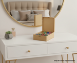 MDF DIY Jewellery Box with colorful items on a white dresser.