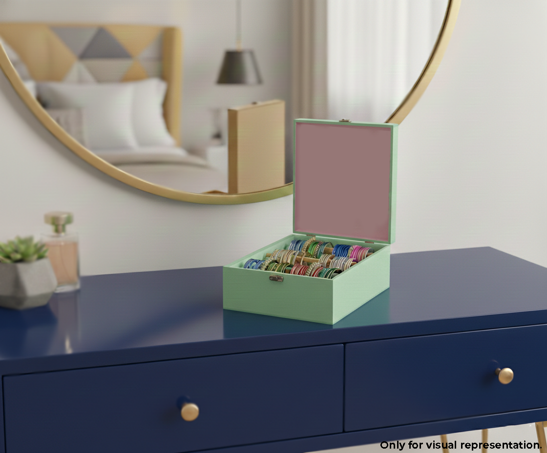 Green MDF DIY Jewellery Box with colorful items on a blue dresser in a bedroom setting
