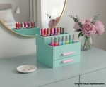 DIY MDF makeup organizer with lipsticks and nail polishes on a vanity table with flowers and mirror.