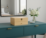 MDF DIY Jewellery Box on a teal dresser with a mirror and flowers in the background