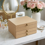 MDF DIY  jeweIlery box with drawers on a marble surface with flowers and a mirror in the background