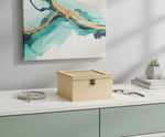 MDF DIY Jewellery Box on a surface with abstract art in the background
