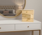 MDF DIY Jewellery Box on a white dresser with a round mirror in the background