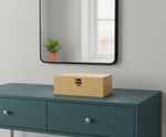 MDF DIY Jewellery Box on a teal dresser with a mirror and plant in the background