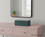 Blue MDF DIY Jewellery Box on a pink dresser with a mirror in the background