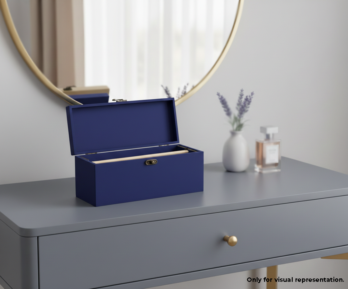 Blue MDF DIY Jewellery Box on a gray dresser with a mirror and decorative items in the background