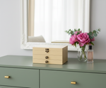 MDF DIY Jewellery Box on a dresser with flowers and perfume bottle in the background