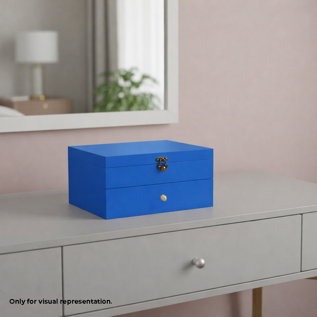 Blue MDF DIY Jewellery Box on a dresser with a mirror and lamp in the background
