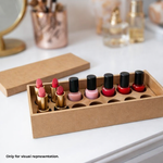 Set of lipsticks and nail polishes in a MDF DIY box holder on a vanity table.