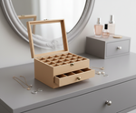 Beige MDF DIY Jewellery Box on a dresser with mirror and small drawer in background