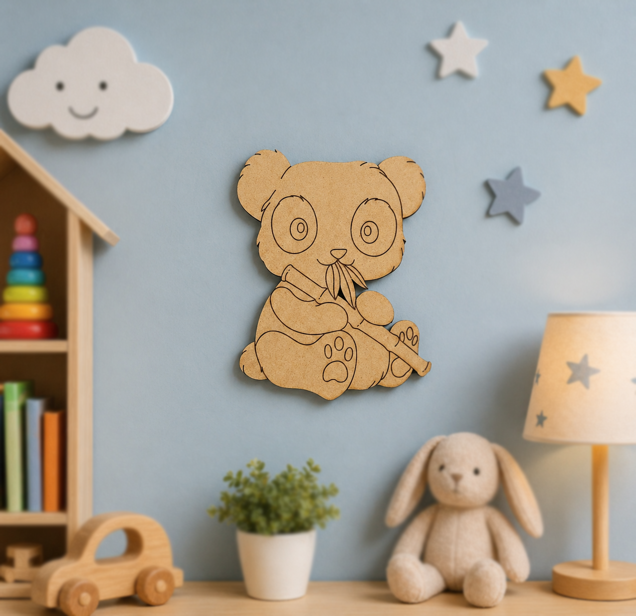 MDF DIY  bear wall decoration on a blue wall with toys and plants below.