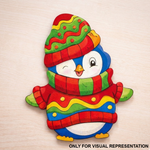 MDF DIY Colorful penguin decoration with a striped hat and scarf on a light wooden background