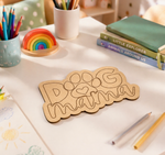 MDF DIY name plaque on a desk with stationery items