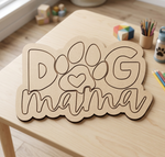 MDF DIY sign with 'Dog Mama' text on a wooden table with toys in the background