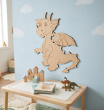 MDF DIY dragon wall decoration in a child's room with toys on a table below.