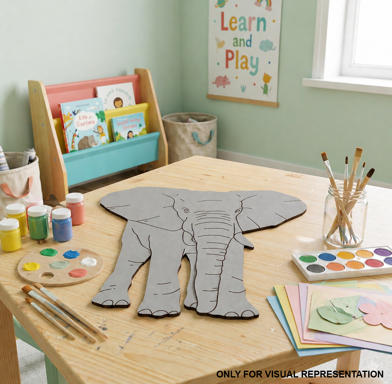MDF DIY Children's art table with elephant craft, paint supplies, and books in a classroom setting.