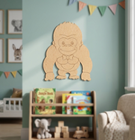DIY MDF Gorilla cutout on a blue wall.