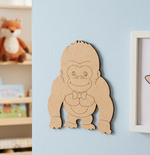 DIY MDF Gorilla cutout on  blue wall.