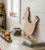 MDF DIY cutout duck on a shelf with toys and books in a child's room.