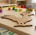 MDF DIY rooster cutout on a table with colorful blocks and toys in the background