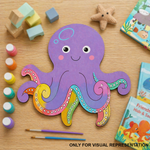 Colorful MDF DIY octopus craft on a wooden surface with art supplies