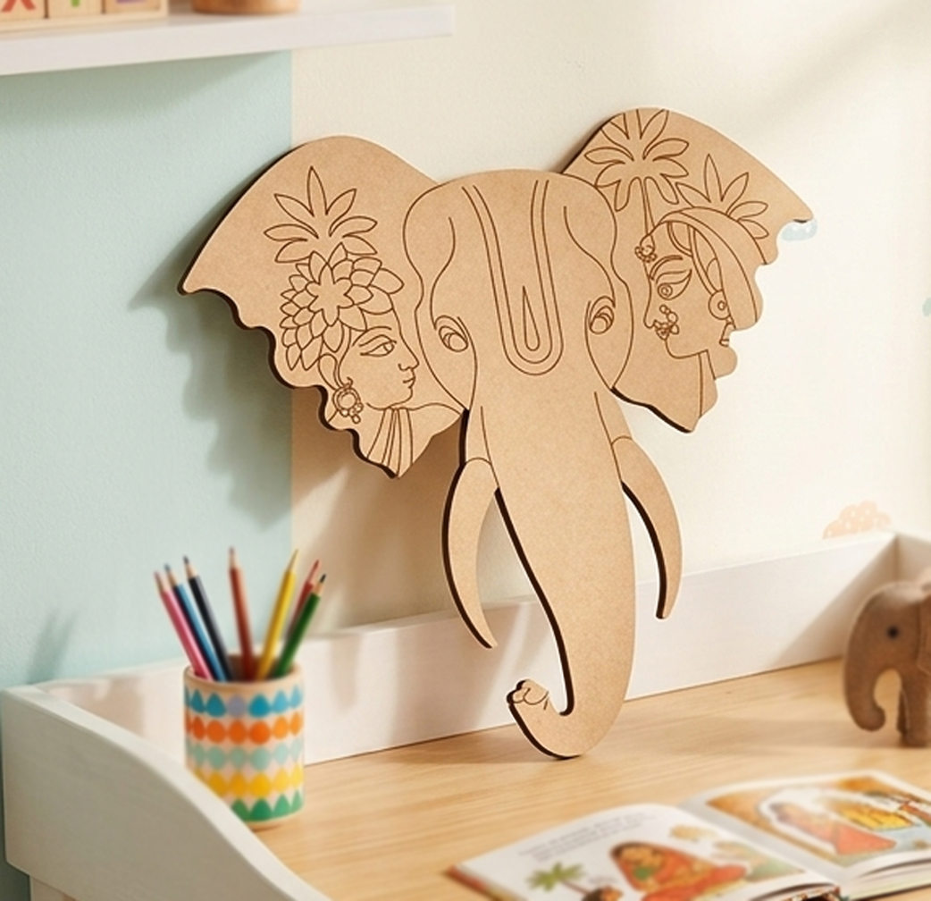 MDF DIY  elephant decoration with artistic designs on a shelf with stationery items.