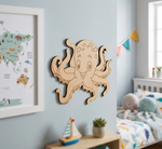 MDF DIY octopus wall decoration in a child's bedroom with a world map and bed in the background.