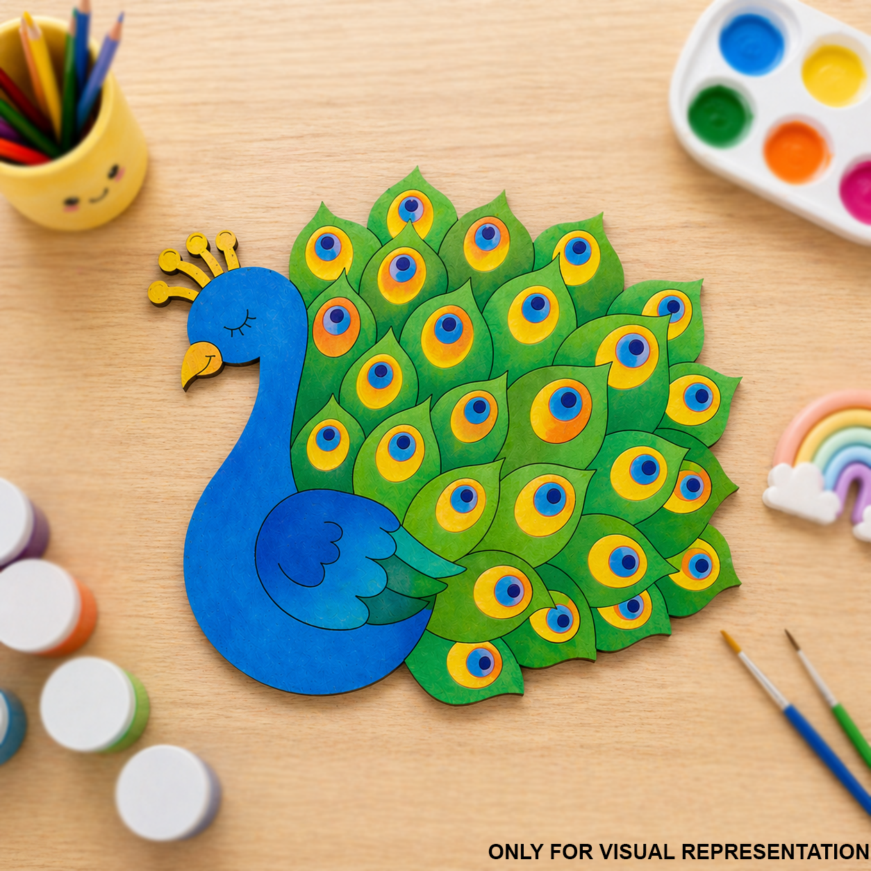 Colorful MDF DIY peacock craft on a wooden table with art supplies.