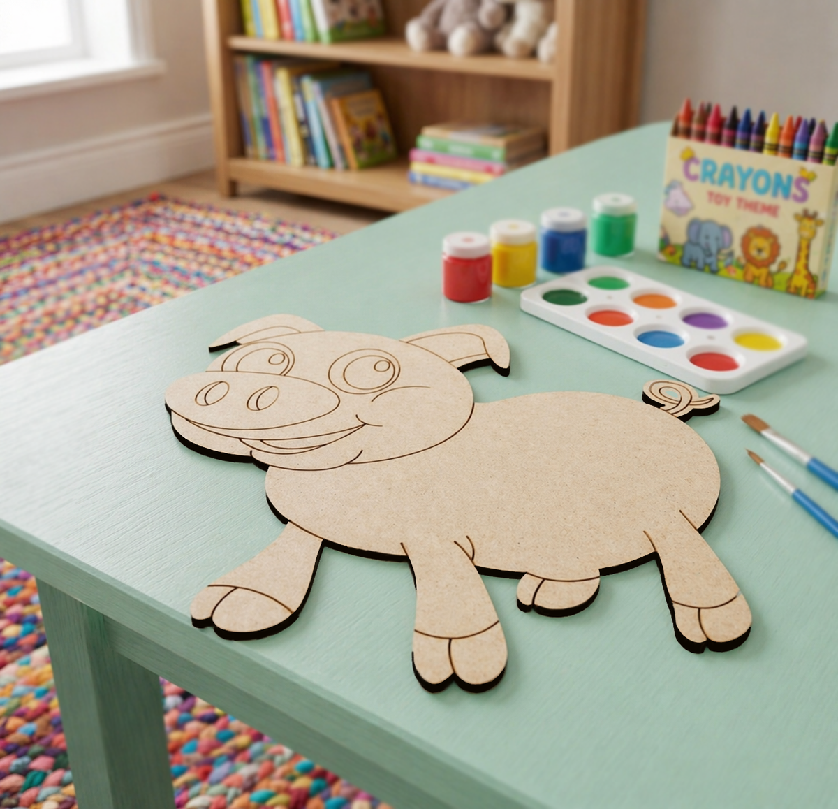 Children's craft activity with a DIY MDF  pig template on a table, surrounded by art supplies.