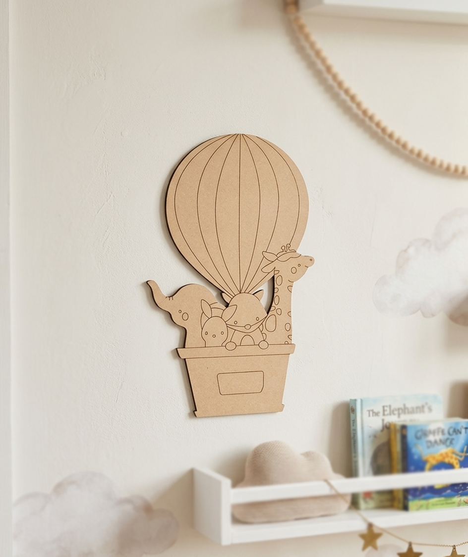 MDF DIY  hot air balloon wall decoration with animals on a white wall.