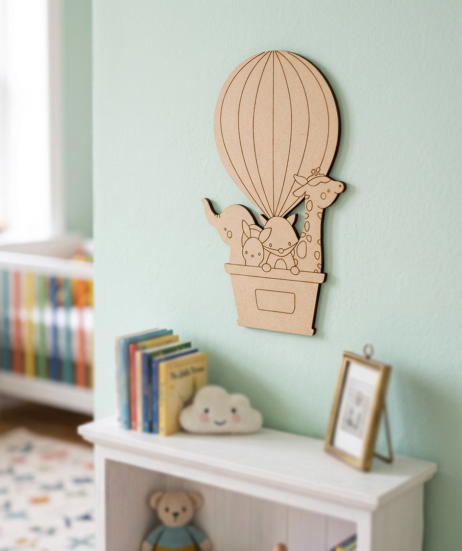 MDF DIY  wall decoration of a hot air balloon with animals on a light green wall.