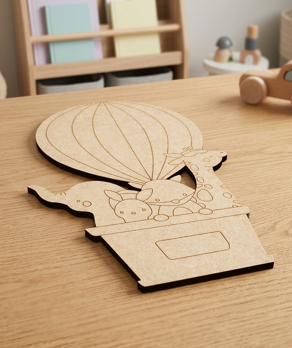 MDF DIY  craft project with hot air balloon and animals on a wooden table