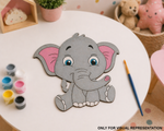 MDF DIY Cartoon elephant cutout on a table with paint cans and a brush, surrounded by decorative items.