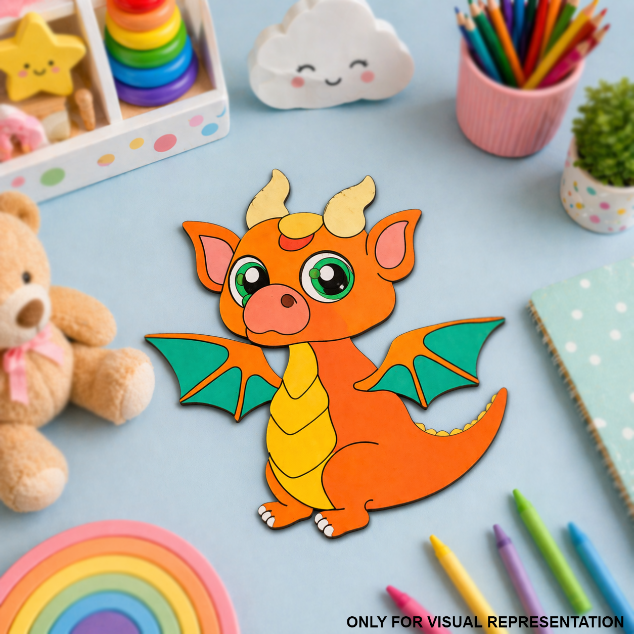 MDF DIY Colorful dragon cutout on a table with toys and stationery items.