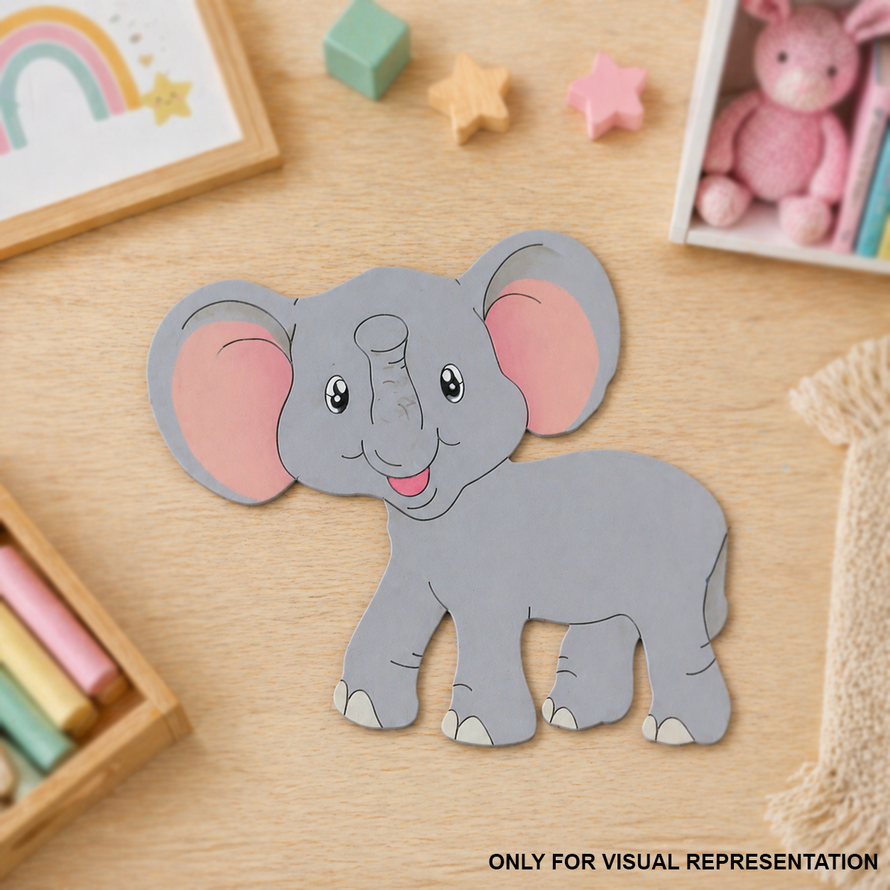 MDF DIY Cartoon elephant cutout on a wooden surface with toys around