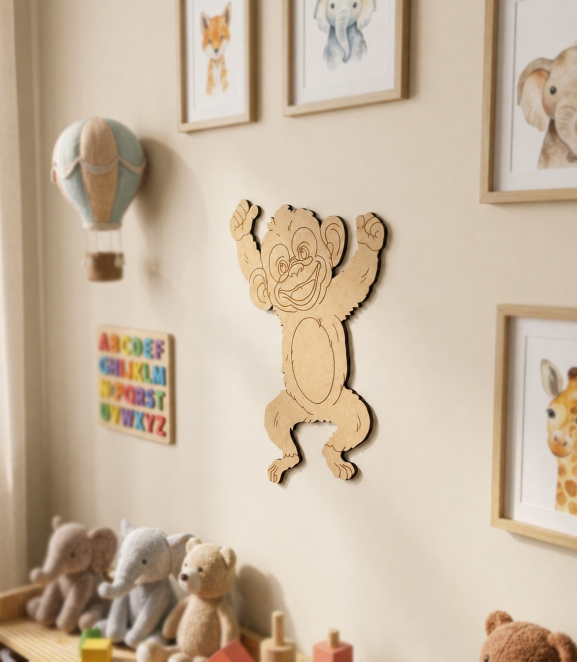 DIY MDF  monkey wall decoration in a child's room with framed animal prints on the wall.