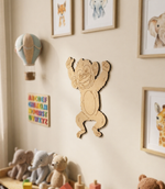 DIY MDF  monkey wall decoration in a child's room with framed animal prints on the wall.