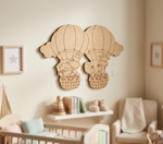 DIY MDF  animal cutout with elephants and hot air balloons in a nursery setting.