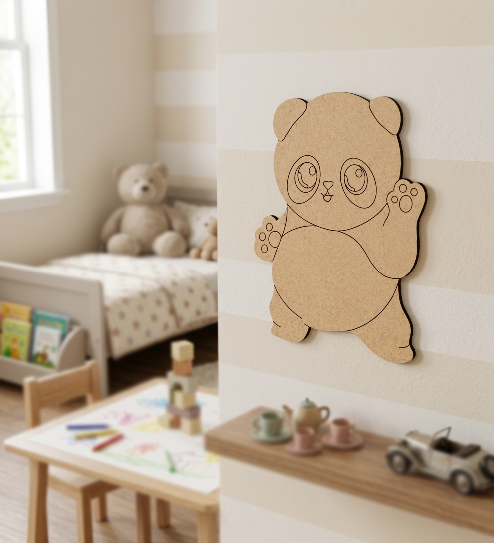 DIY MDF  panda wall decoration in a child's room with a bed and toys.