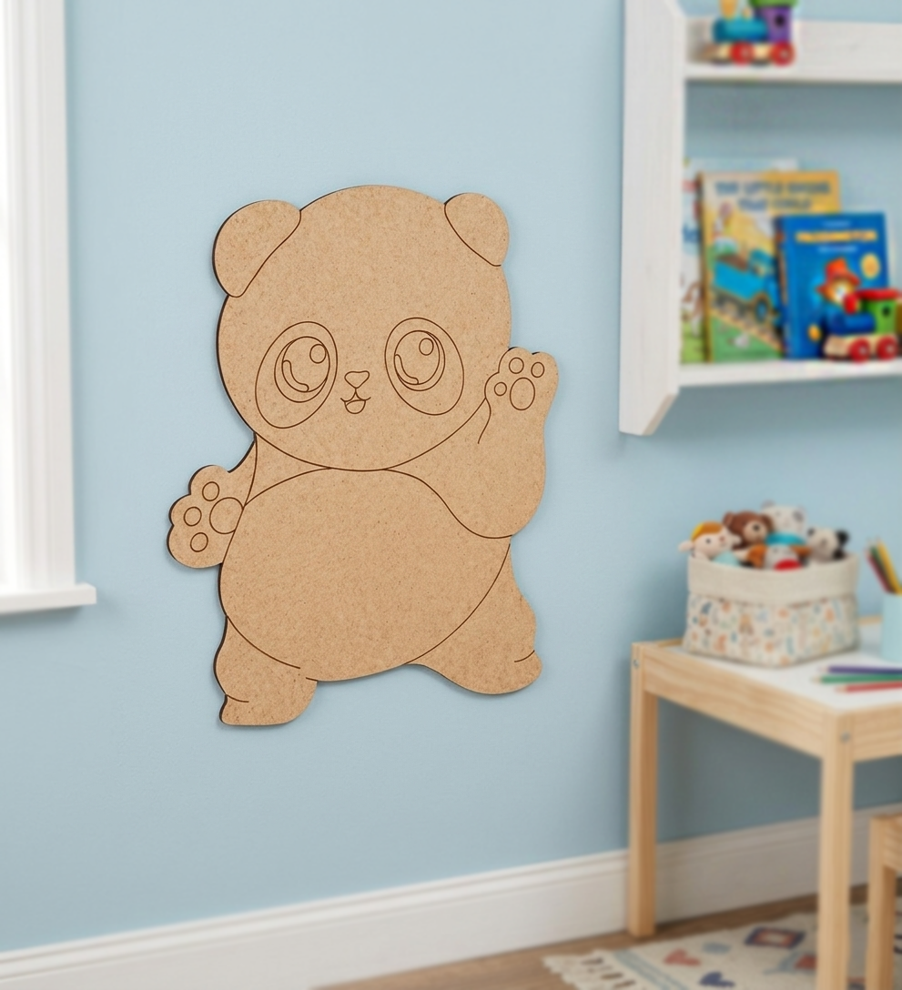 DIY MDF panda cutout on a blue wall in a child's room with books and toys.