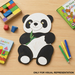 Children's craft DIY MDF panda with educational toys on a wooden surface