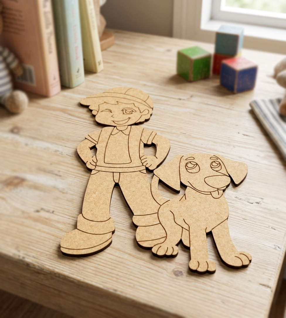 MDF DIY cutouts of a boy and his dog on a wooden surface with toys in the background.