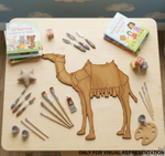 MDF DIY Children's art supplies on a table with a camel template and books.