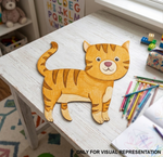 MDF DIY cat cutout on a child's desk with coloring supplies